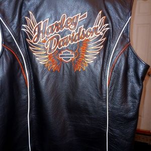 Harley Davidson leather vest /black w orange trim/size large